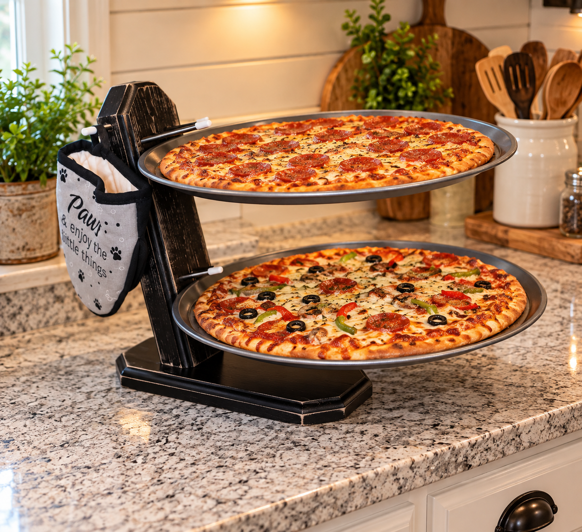 Three-tier handmade wooden cooking lid holder that also hold baking pans, cooling racks, muffin pans and platters. The angle allows it to hold a lot of weight without tipping. You can also hang pot holders and utensils on the side pegs. Also amazing for grilling, camping, or saving space in RVs and picnic tables.  (Black option shown here)