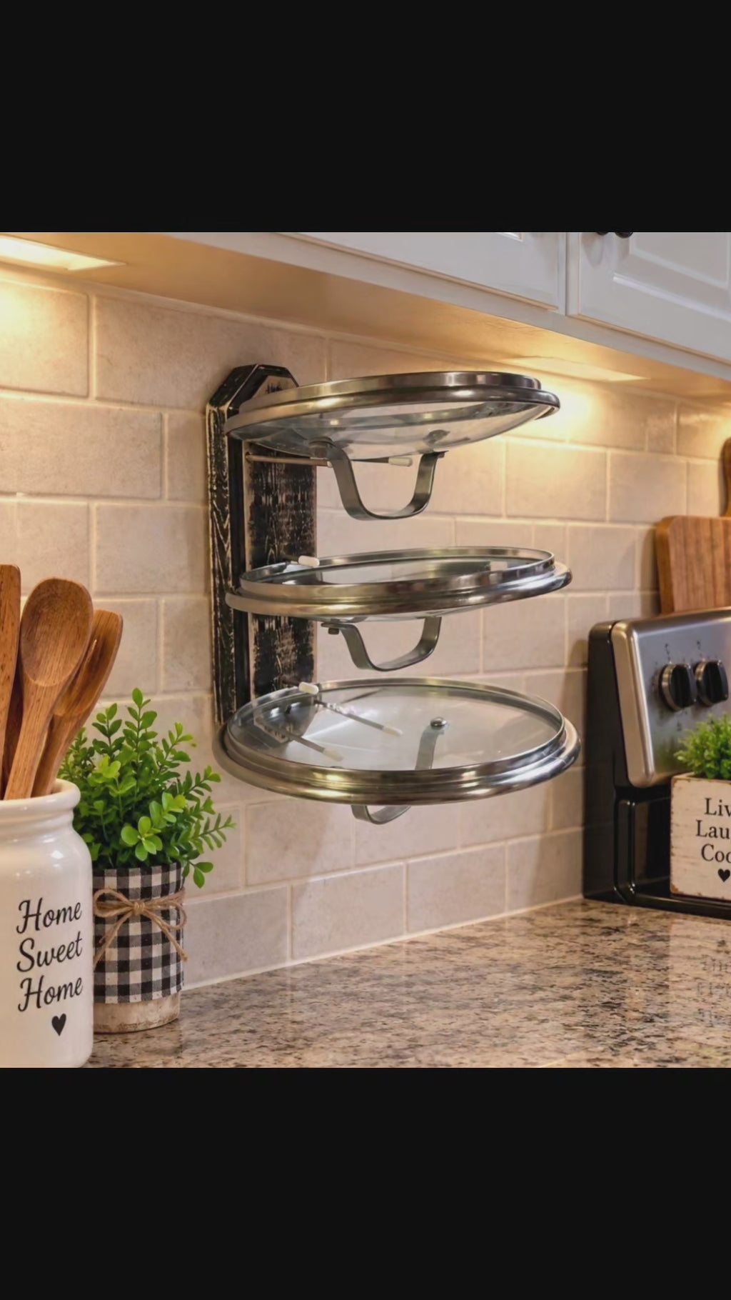 Three tier cooking lid holder that holds cooking lids upside down to prevent spillage of condensation on your counters and also frees up counterspace for meal prep. They hold all shapes and sizes of lids, platters & cookie sheets. They can also be mounted inside cabinets to organize your cooking lids.  (Black option shown)