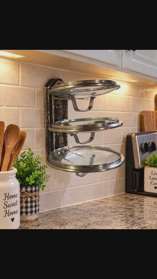 Three tier cooking lid holder that holds cooking lids upside down to prevent spillage of condensation on your counters and also frees up counterspace for meal prep. They hold all shapes and sizes of lids, platters & cookie sheets. They can also be mounted inside cabinets to organize your cooking lids.  (Black option shown)